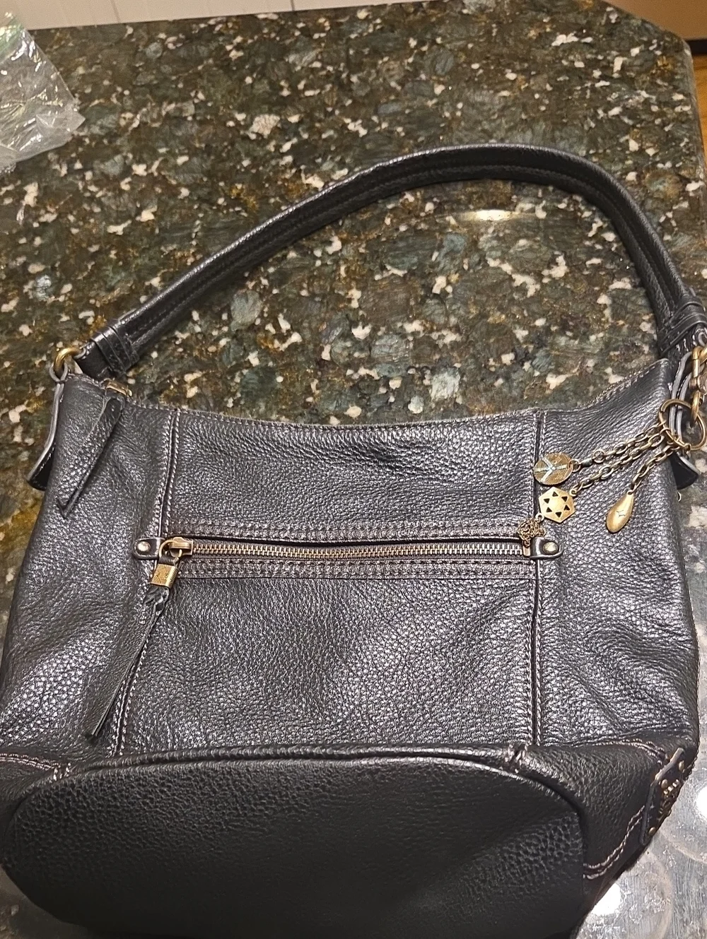 The Sak Black Pebbled Leather Shoulder Bag with Charm Accents